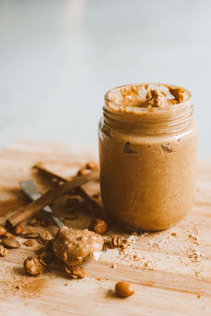 Peanut butter frosting in a glass mason jar