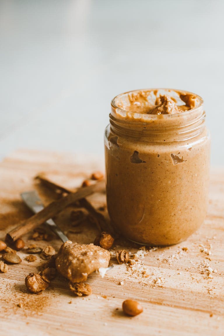 Peanut butter frosting in a glass mason jar