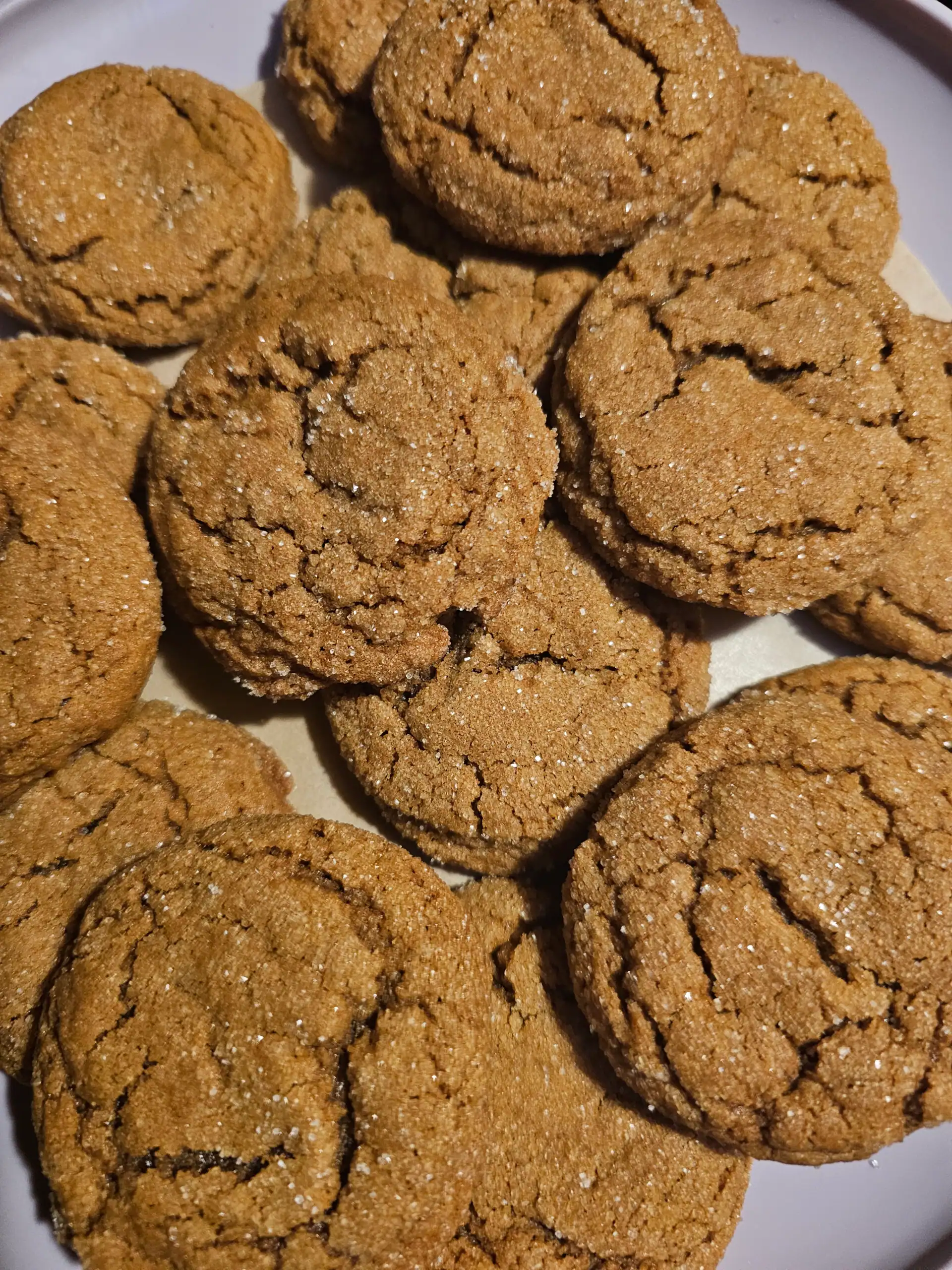 Soft molasses cookies on plate
