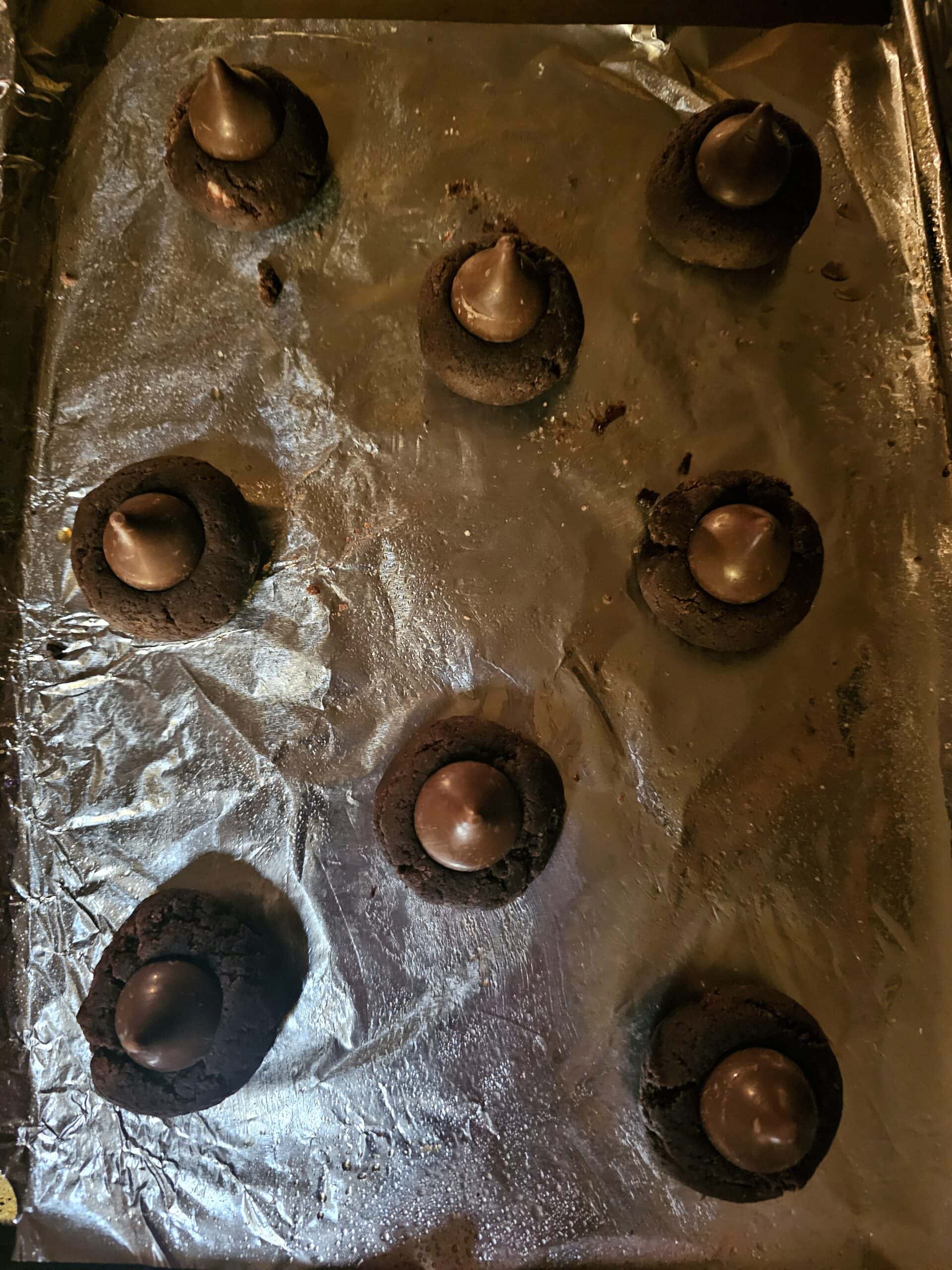 Chocolate Cherry Cordial Thumbprint Cookies on baking tray before baking