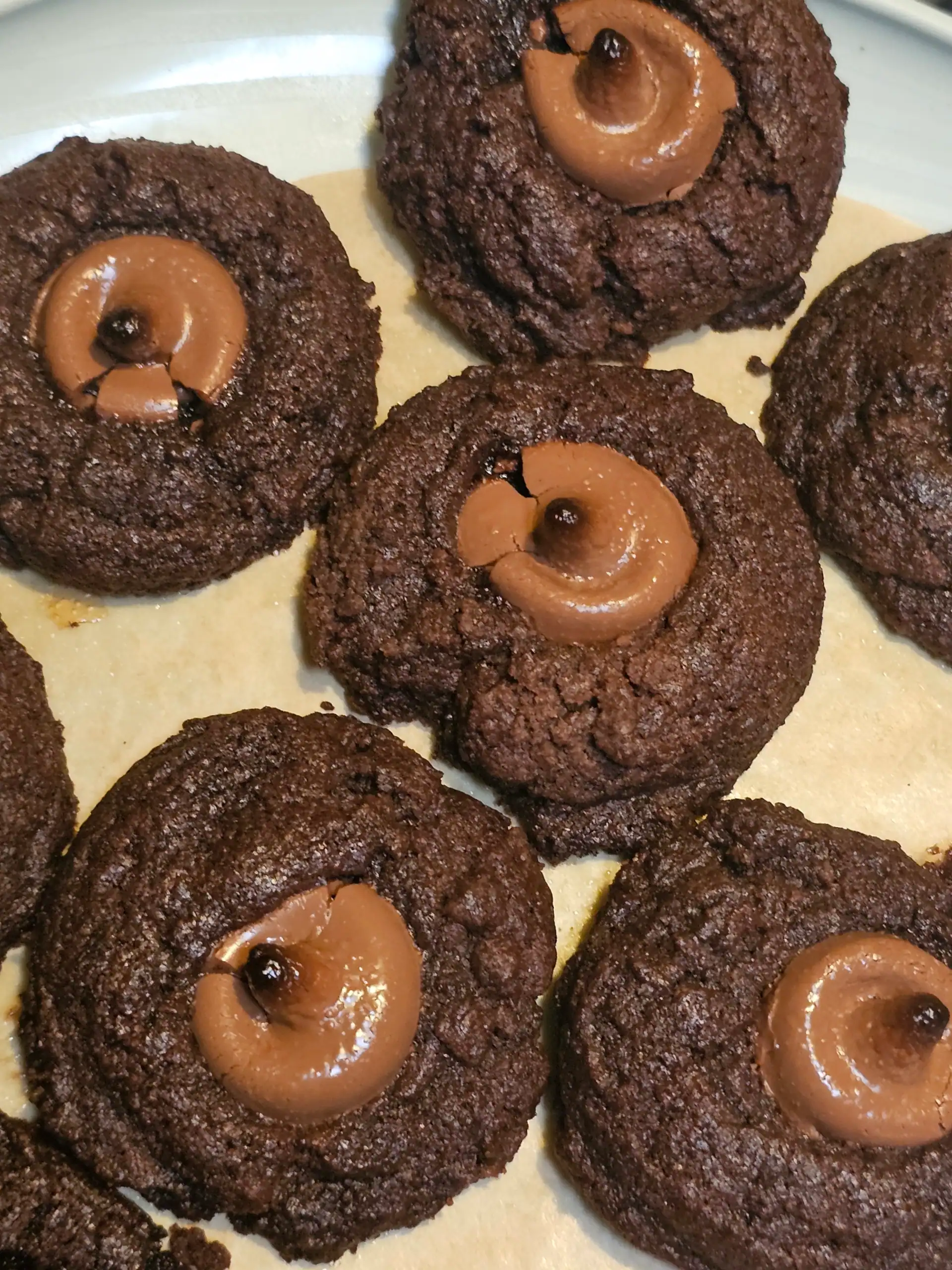 Chocolate Cherry Cordial Thumbprint Cookies on plate