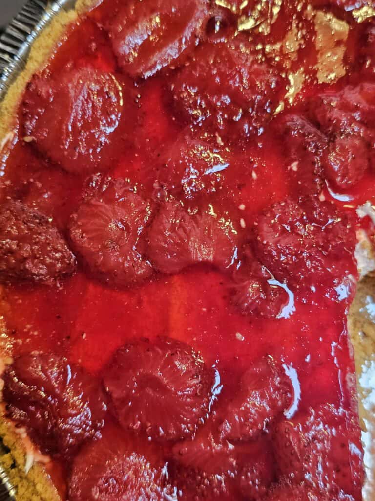 Strawberry pretzel salad in piee dish